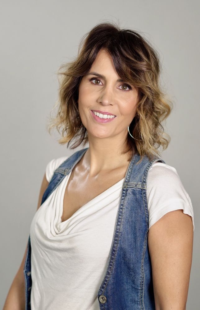Headshot con gilet di jeans